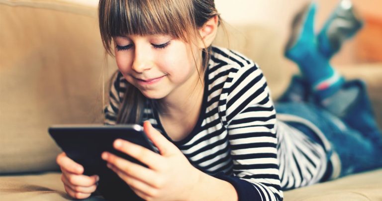 Little Girl Looking at a Product Page